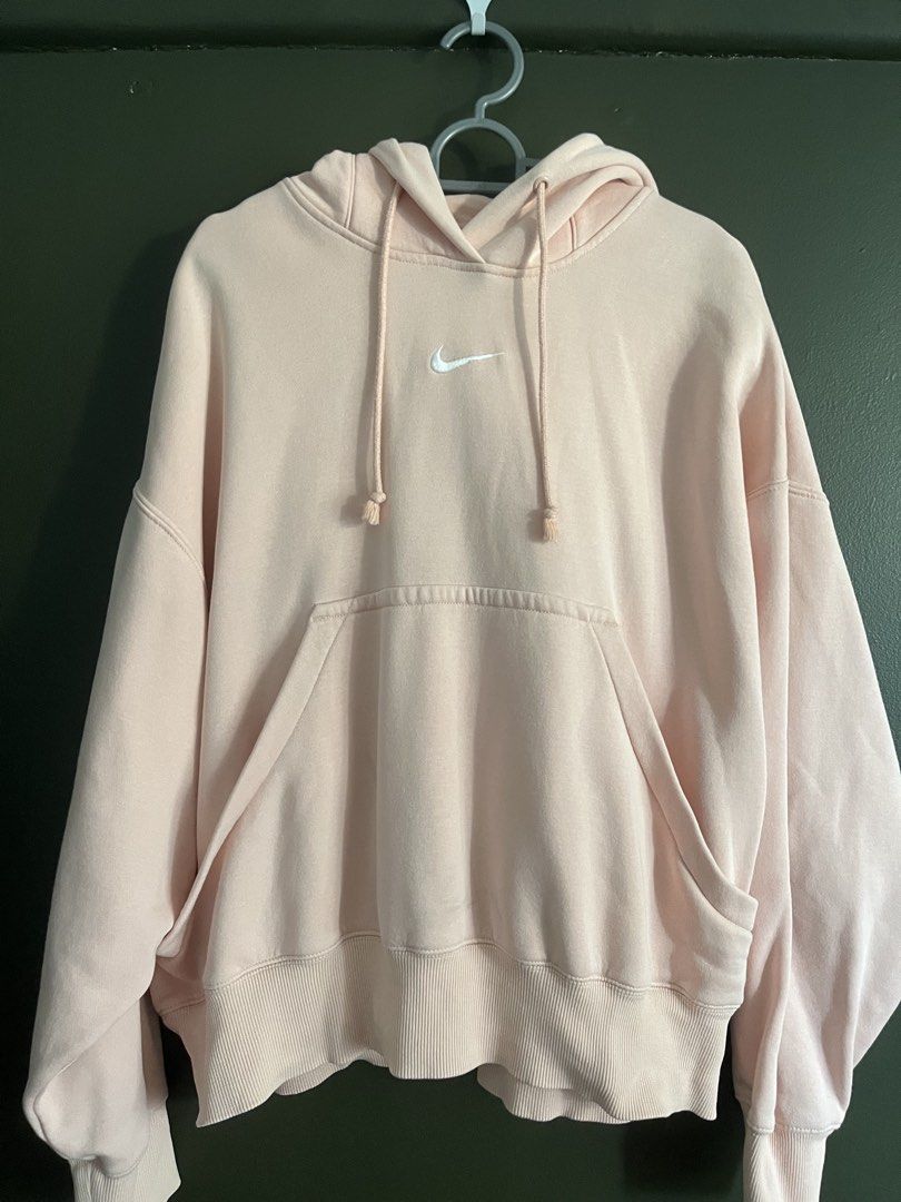 Nike pink hoodie (Category: Coats, Jackets and Outerwear) located in Paranaque City. Submitted by colsness (Listing ID 1462291926, Image 1). Description: Original Nike Hoodie Bought in singapore Size S Loose style With a little stain in the pocket area Rfs: not using anymore.