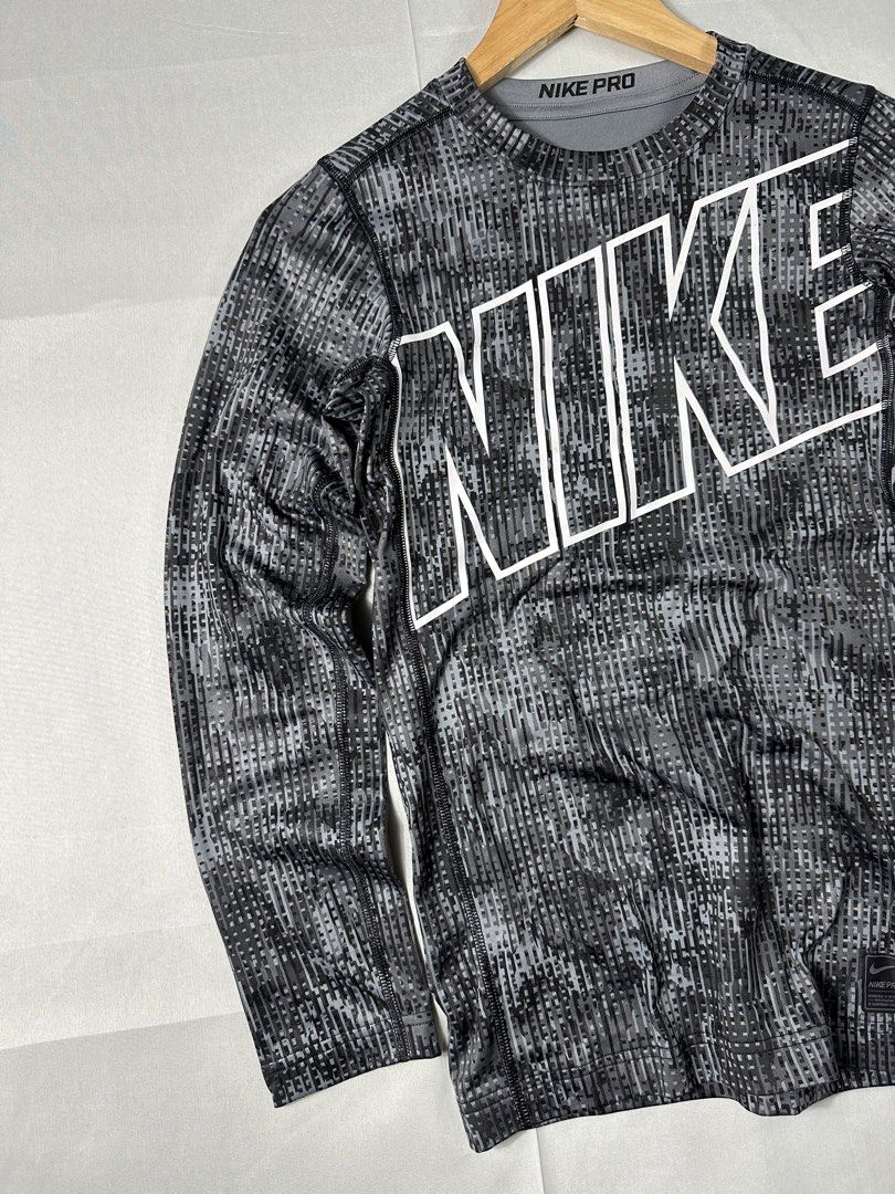 Nike Pro Compression Shirt (Category: Activewear) located in Cabanglasan. Submitted by thefashiongarage.co (Listing ID 1462439406, Image 3). Description: Title - Nike Pro Model/Name - Compression Shirt Size on Tag - XL Can fit to XXS women Conditiion - Excellent as new Dimension (WxLxH) - 15x24 Inches Category- Work out Shirt Fitting - Fitted Made in - Sri Lanka Material - 88% Polyester/ 12% Spandex Color - Gray/Black Design - Camou Year - Inclus