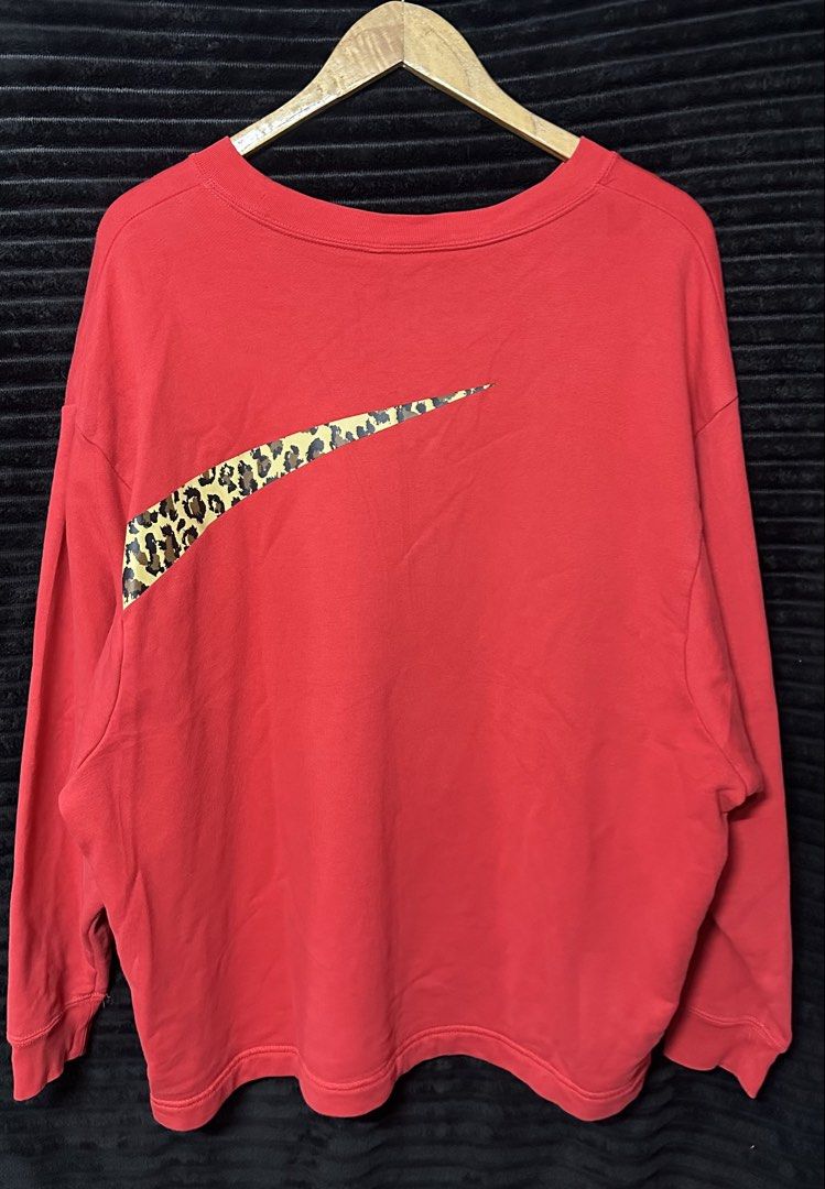 Nike Red Leopard Swoosh Crewneck Sweatshirt (Category: Coats, Jackets and Outerwear) located in Taguig. Submitted by thriftboy23 (Listing ID 1462333411, Image 3). Description: Excellent Condition Color rate: 10/10 Flawless Size XL Width: 25.5 Length: 27.