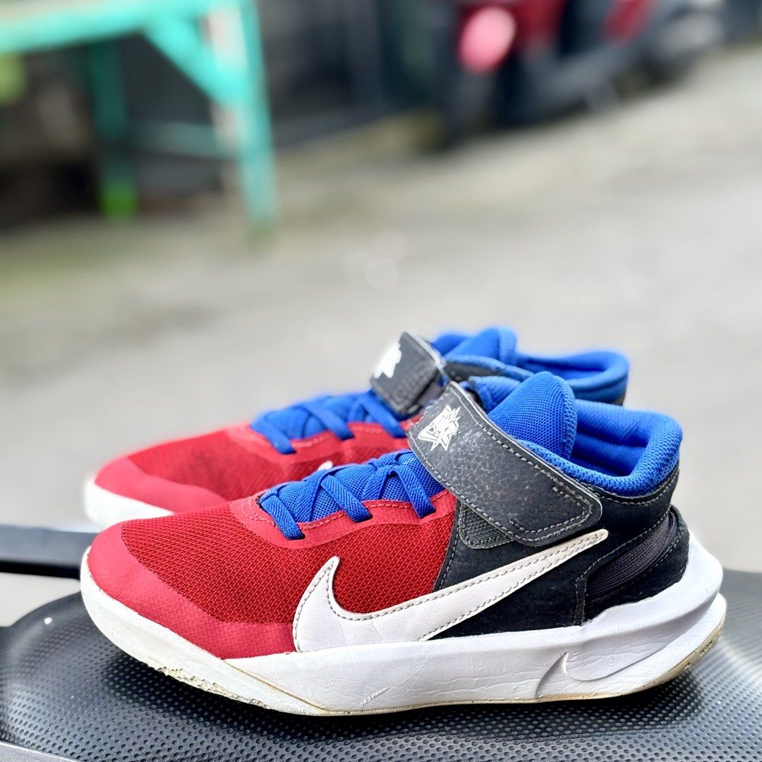 Nike Team Hustle D10 (Category: Babies & Kids Fashion) located in San Fernando. Submitted by kickslocker (Listing ID 1462351887, Image 2). Description: - Nike Team Hustle D10 kids' shoes - Color: Red, black, and blue - Size: 33.5 Euro / 21cm - Features: Easy velcro strap for quick on and off - Ideal for: Basketball, sports, or everyday casual wear - Price: PHP 349.