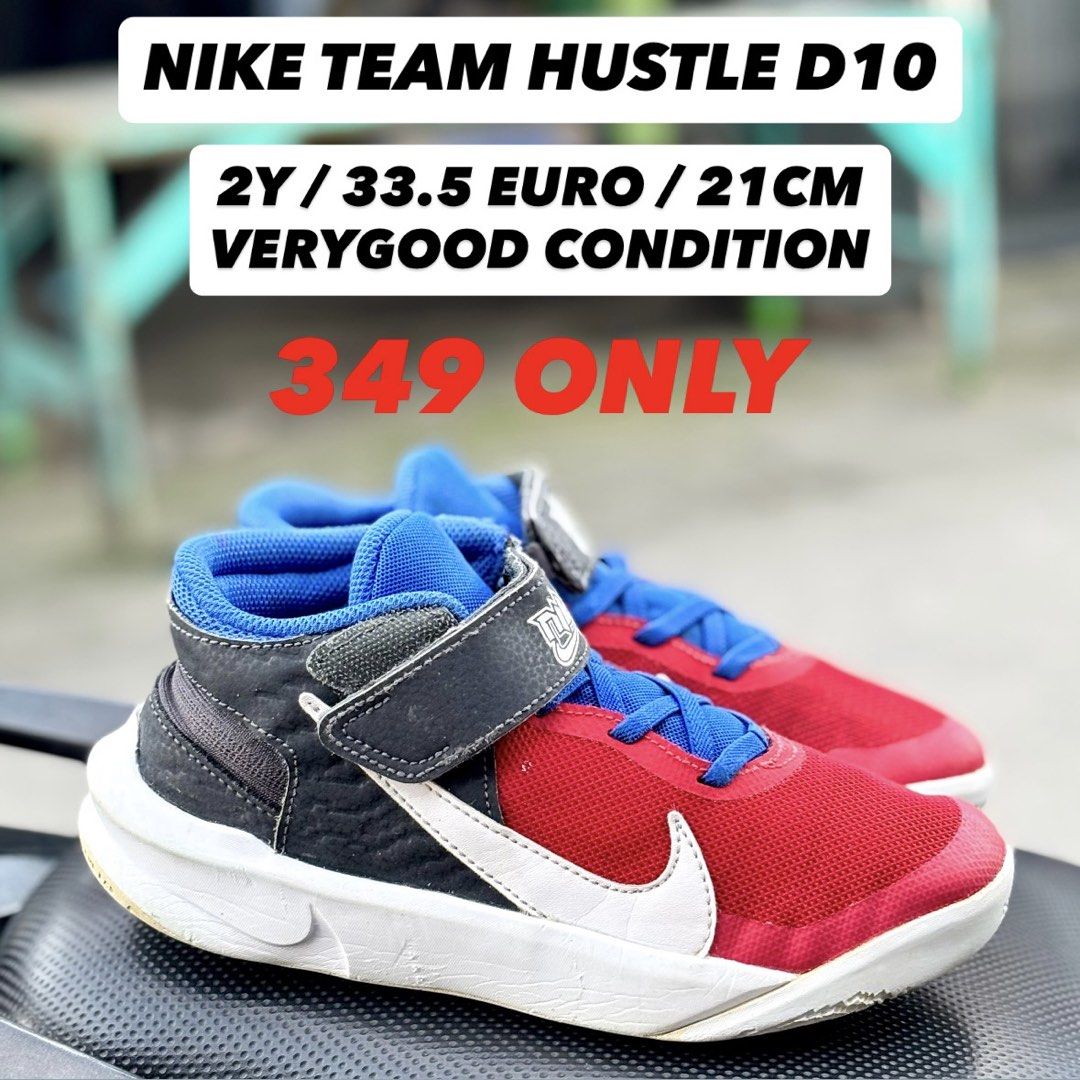 Nike Team Hustle D10 (Category: Babies & Kids Fashion) located in San Fernando. Submitted by kickslocker (Listing ID 1462351887, Image 1). Description: - Nike Team Hustle D10 kids' shoes - Color: Red, black, and blue - Size: 33.5 Euro / 21cm - Features: Easy velcro strap for quick on and off - Ideal for: Basketball, sports, or everyday casual wear - Price: PHP 349.