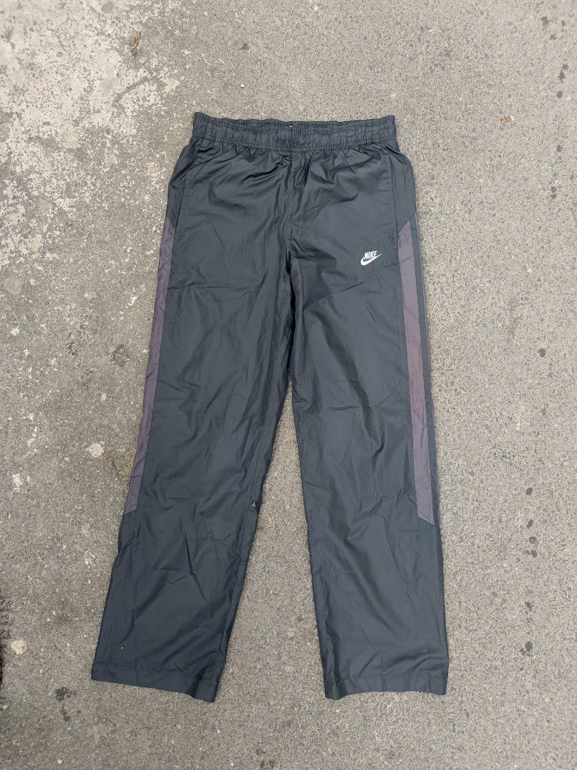 Nike track pants embroidered logo (Category: Activewear) located in Taguig. Submitted by oswyn_thrifts (Listing ID 1462268870, Image 1). Description: Nike Track Pants Embroidered logo excellent condition no issue small on tag, best fits large Dimes: W-30 to 36 L-40 Leg open-9 750+sf taguig.