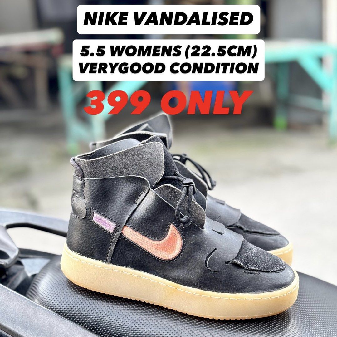 Nike Vandalised Women's (Category: Sneakers) located in San Fernando. Submitted by kickslocker (Listing ID 1462351774, Image 1). Description: - Nike Vandalised High-top Sneakers - Women's Size 5.5 (22.5cm) - Color: Black with Pink Accents - Features: Gum Sole - Condition: Very Good - Price: PHP 399.