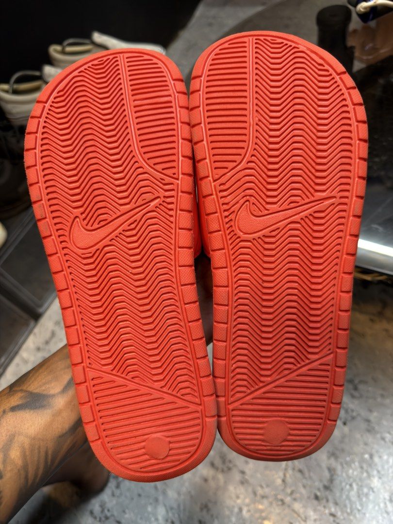 Nike x Stussy Benassi Red Slides (Category: Slippers & Slides) located in Manila. Submitted by raven236 (Listing ID 1462392072, Image 2). Description: - Red Nike Benassi Slides x Stussy - Size: US 9 / UK 8 / EUR 42.5 / CM 27 - Made in Indonesia - Ideal for casual wear or post-workout comfort - Stylish and comfortable design.