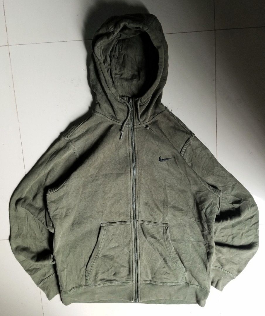 Nike zip up hoodie (Category: Coats, Jackets and Outerwear) located in Bacolod City. Submitted by richjohn.958 (Listing ID 1462396609, Image 1). Description: - Olive green Nike hoodie - Full zip closure with front pocket - Drawstring hood - Classic Nike swoosh logo on chest - Soft fleece lining for comfort - Ideal for everyday casual wear.