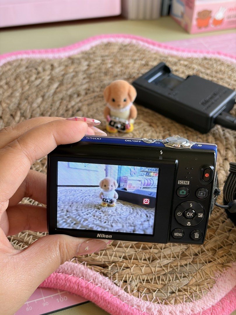 Nikon Coolpix S5100 Blue digicam (Category: Cameras) located in Taguig. Submitted by ideclutterss (Listing ID 1462438443, Image 3). Description: Original Nikon CoolPix S5100 in Blue 12.2 megapixels 5x optical zoom VR 2.7inch display 720p HD movie recording orig casing and battery included working charger all buttons are working flash is working no functional issue light scratches only and black spot on the screen (does not affect the quality of t