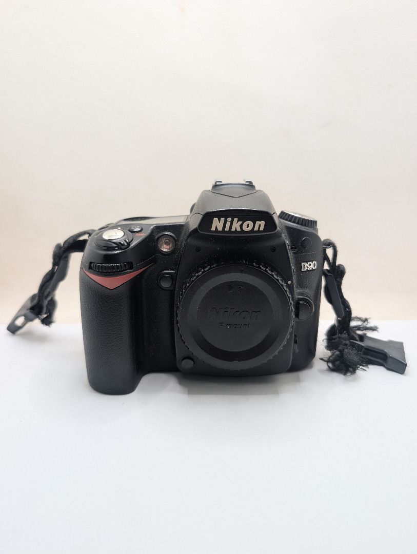 Nikon D90 DSLR Camera with Lens (Category: Cameras) located in Bacoor. Submitted by jeth.goods (Listing ID 1462317201, Image 1). Description: Selling my Nikon D90 with an 18-135mm zoom lens. Great, reliable starter camera for beginners, hobbyists, or students learning photography. Inclusions: • Nikon D90 body • Nikon 18-135mm zoom lens • Original Nikon battery & charger • Extra Type-C rechargeable battery • Camera strap • Padded camera bag • Batt