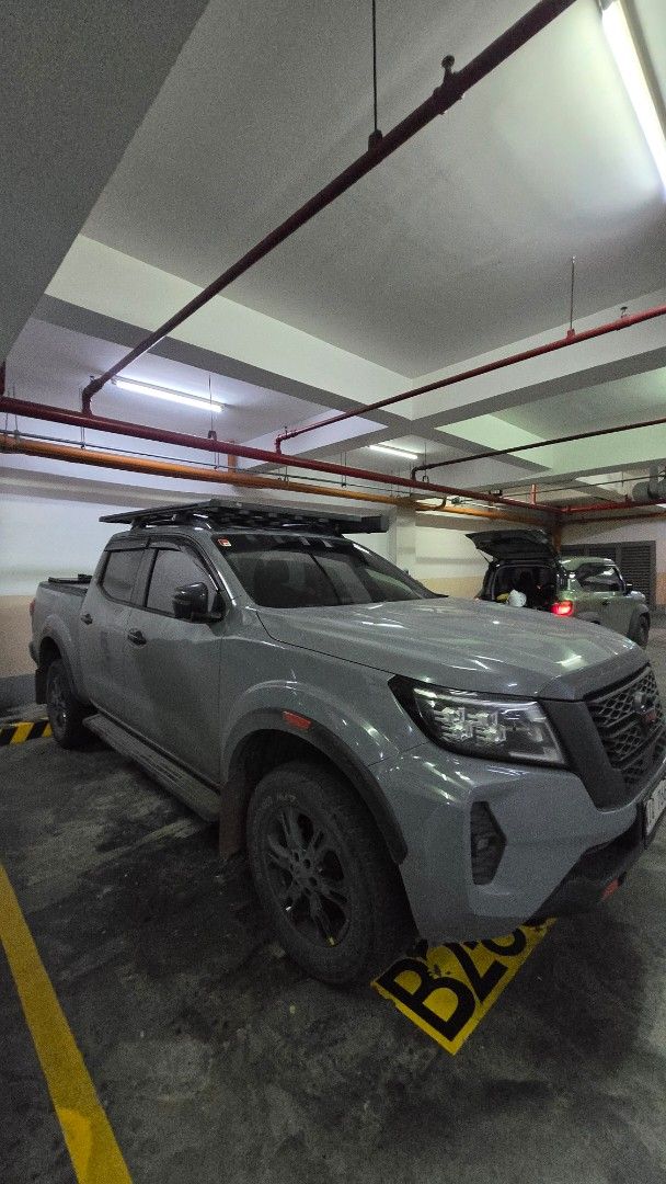 Nissan Navara Pro 4x Auto (Category: Used Cars) located in Taguig. Submitted by yuujin_echo (Listing ID 1462367381, Image 2). Description: Nissan Navara Pro-4x 2024 Stealth Grey 27,160km Inclusions: - Flat Blade-Type roof rack - Side Roll-Out Canopy - Tri-Fold bed cover - Full Bed-Liner w/ cargo anchor rail - Original Yokohama Tires - Original Tire Jack - Original Spare Tire All original parts, only changed the battery last year Last PMS 2/24/26 