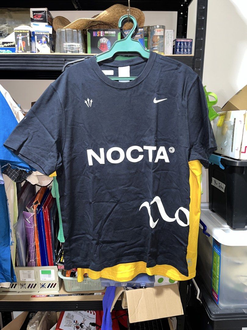 Nocta x Nike Tshirt (Category: Tshirts & Polo Shirts ) located in Calapan. Submitted by axlefinestpicks (Listing ID 1462268700, Image 2). Description: 9/10 color rate Good print condition 21" width 28" length.