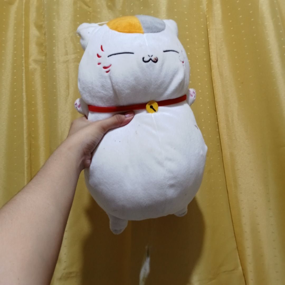Nyanko Sensei (Category: Plushies & Soft Toys) located in Quezon City. Submitted by trinket_cat (Listing ID 1462424225, Image 1). Description: Lucky cat plush with paper tag and etiketa .
