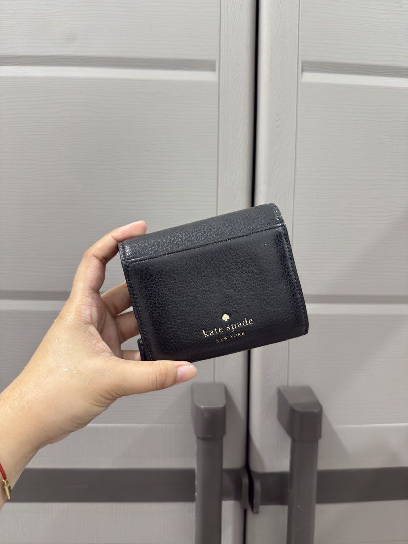OG Kate Spade Marti Wallet (Category: Luxury Bags & Wallets) located in Bacoor. Submitted by katie_tephanii (Listing ID 1462353485, Image 2). Description: • Original (sourced from US Pasabuy) • Slightly Used • Good Condition • with papertag •OG price 5000.