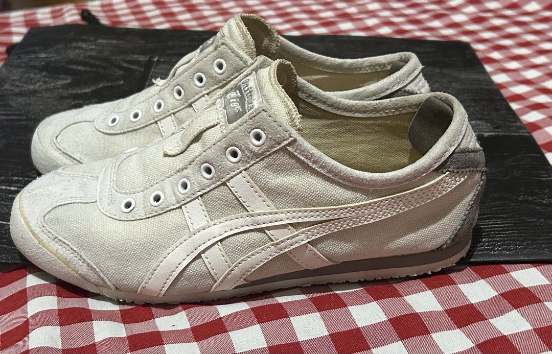Onitsuka Tiger Mexico 66 Sneakers (Category: Sneakers) located in Plaridel. Submitted by ilovebubu28 (Listing ID 1462296412, Image 2). Description: - Classic Onitsuka Tiger Mexico 66 - Laceless, slip-on style - White canvas with signature stripes - Soles have good grip - Plenty of life remaining.