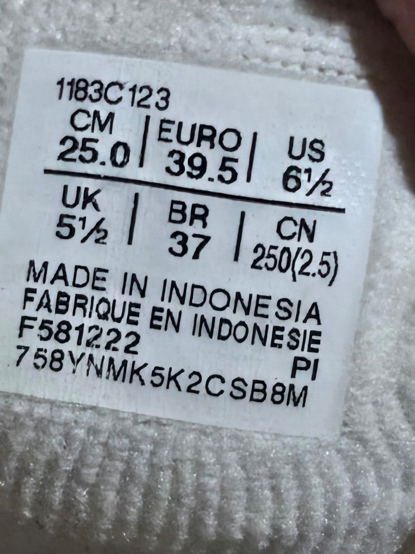 Onitsuka Tiger White Mesh Slip-On Shoes (Category: Sneakers) located in Pasig City. Submitted by princesspow (Listing ID 1462329025, Image 1). Description: - White Onitsuka Tiger slip-on shoes - Breathable mesh upper - Iconic yellow and red stripe accents - Size: 39.5 Euro / 6.5 US - Made in Indonesia - Minor signs of wear on sole and fabric.