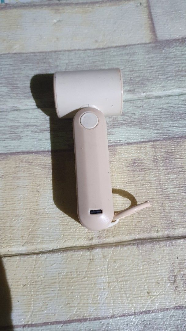 Oradshare Portable Mini Fan with Keychain and USB-C (Category: Fans) located in Cebu City. Submitted by gelmarbrig15075 (Listing ID 1462434287, Image 2). Description: - Super cute portable fan - Keychain loop for easy attachment - USB-C charging - Small digital display shows fan speed - Ideal for on-the-go cooling - Compact and lightweight design.