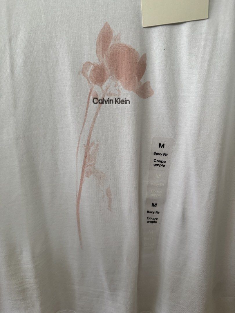 Original CK shirt (Category: Shirts) located in Bustos. Submitted by shergusshop.ph (Listing ID 1462278114, Image 3). Description: Calvin Klein shirt medium size boxy fit. Bought in CK store Canada. Can fit large frame. Please refer to photos for measurements. MOP: BDO, Gcash Location: Bulacan.