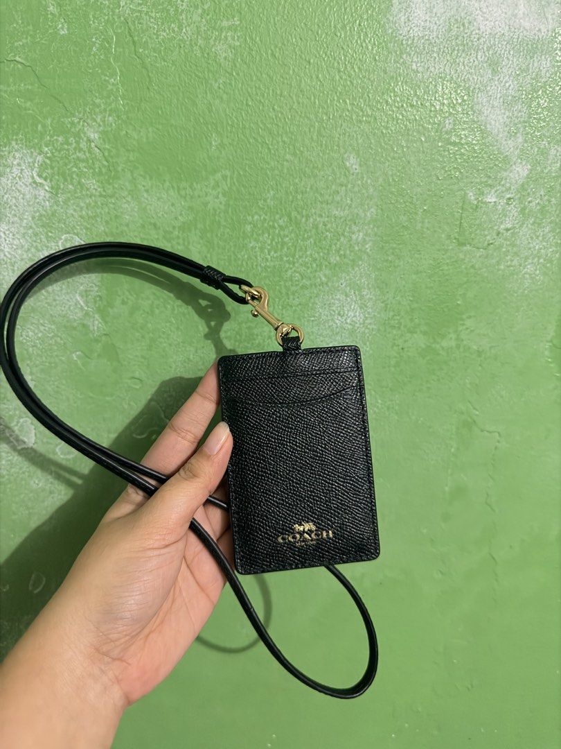 ORIGINAL Coach ID Lanyard (Category: Cross-body Bags) located in Manila. Submitted by janinegordula03 (Listing ID 1462346542, Image 2). Description: ‎-Preloved but good as new since I used it only once -pristine condition ‎-can send more photos upon request -Mode of payment: Bank transfer Instapay only ‎Mode of Delivery: ‎Shipment via J&T,Grab, or Lalamove ‎Can do meet up on the following location: SM North Trinoma Vertis North ‎SM Makati ‎One Ay