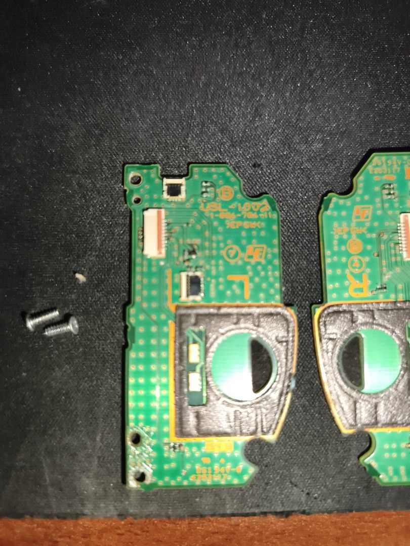 Original PSVita 2000 Controller Circuit Boards (Category: Controllers) located in Davao. Submitted by duriandragonfruit (Listing ID 1462426033, Image 3). Description: - Set of Original PSVita 2000 controller circuit boards, Left and Right - Screws included. - Please check photos carefully to confirm compatibility. - Sold as is, ideal for repair or parts..