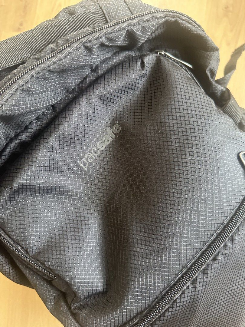 Pacsafe Anti-Theft Camera Backpack camsafe x25 (Category: Backpacks) located in Quezon City. Submitted by dlsy12 (Listing ID 1462283842, Image 2). Description: - Secure black Pacsafe backpack - Padded compartments for camera gear - RFID-safe pocket for sensitive items - Lockable zippers for enhanced security - Ideal for travel or everyday use - its own padded laptop compartment - Multiple pockets for excellent organization with rfid protection - 