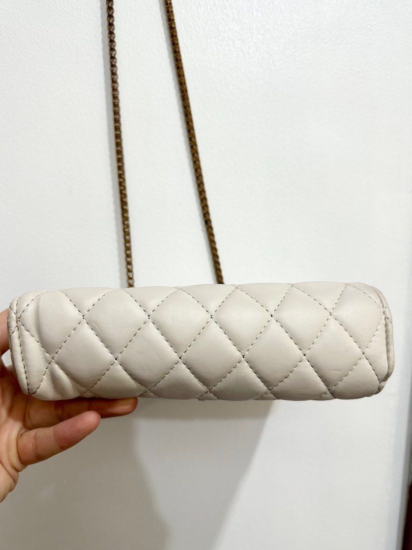 Pale Pink Quilted Chain Shoulder Bag (Category: Shoulder Bags) located in Quezon City. Submitted by decluttering_alot (Listing ID 1462311072, Image 2). Description: - Pale pink quilted shoulder bag - Gold chain strap - Flap closure with metal clasp - Interior zippered compartment - Small and compact size - Versatile for nights out or casual wear RFS: closet cleanup, never used.