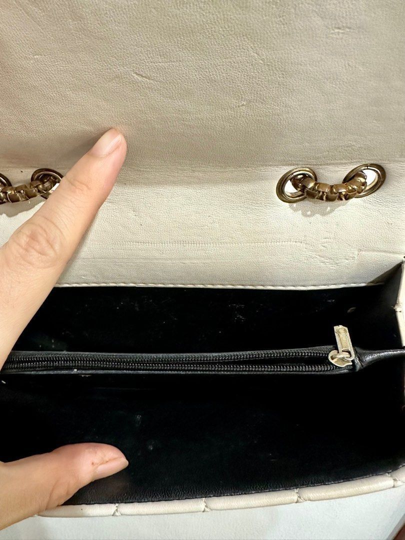 Pale Pink Quilted Chain Shoulder Bag (Category: Shoulder Bags) located in Quezon City. Submitted by decluttering_alot (Listing ID 1462311072, Image 3). Description: - Pale pink quilted shoulder bag - Gold chain strap - Flap closure with metal clasp - Interior zippered compartment - Small and compact size - Versatile for nights out or casual wear RFS: closet cleanup, never used.