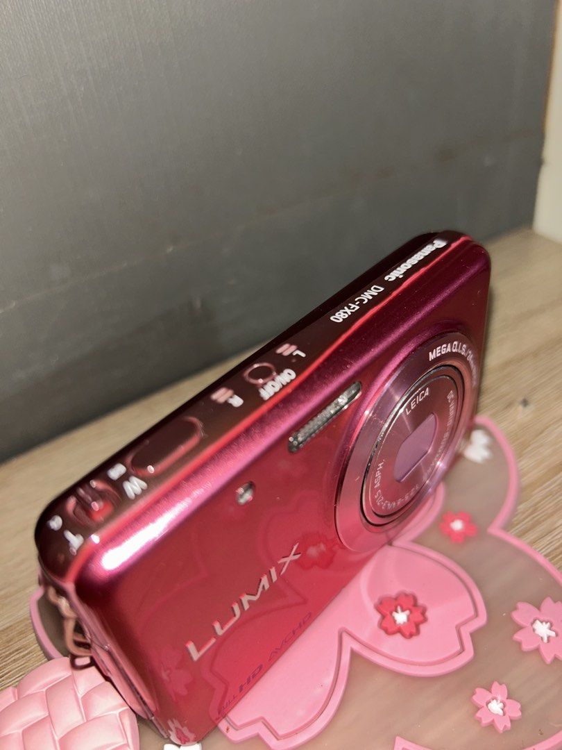 Panasonic Lumix DMC-FX80 Pink Digital Camera (Category: Cameras) located in Antipolo. Submitted by beautyxiii (Listing ID 1462266826, Image 2). Description: - Pink Panasonic Lumix DMC-FX80 camera - Features a high-quality Leica lens - Records Full HD AVCHD video BODY 8/10 Comes with original charger Touchscreen Japanese language only tho easy no navigate Issue: last 2 pictures my line even when ON and OFF when i bought this wala siyang ganun napa