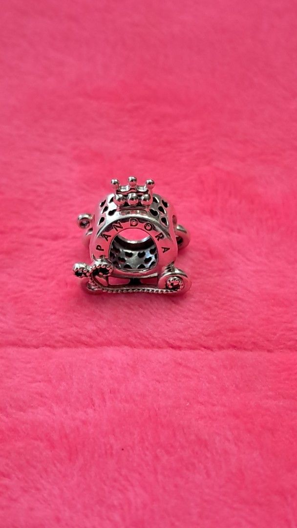 Pandora Sterling Silver Cinderella Carriage Charm (Category: Charms) located in Santa Rosa. Submitted by majanice (Listing ID 1462276434, Image 1). Description: - Authentic Pandora Charm - bought from Pandora Makati - Sterling Silver - Shaped like Cinderella's Carriage - Features engraved Pandora logo - Ideal for Pandora bracelets - Pre-loved, selling as it's no longer worn.