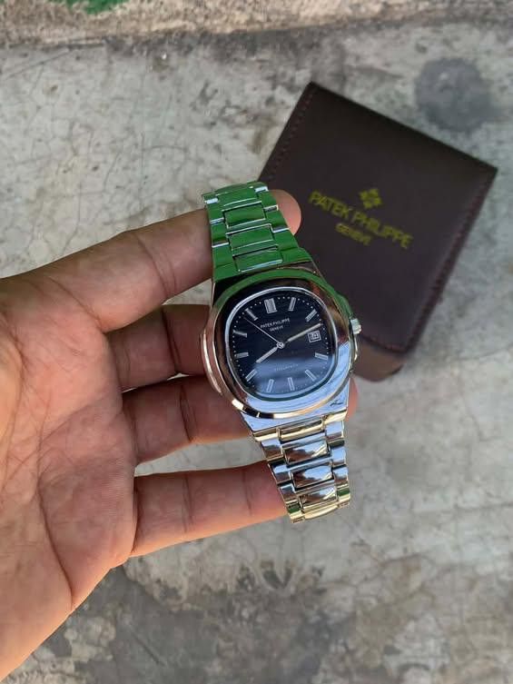 patek philippe nautilus (Category: Men's Watches) located in Manila. Submitted by trustthrift2002 (Listing ID 1462376196, Image 3). Description: patek philippe watch black dial excellent working heavy,heavy strap.
