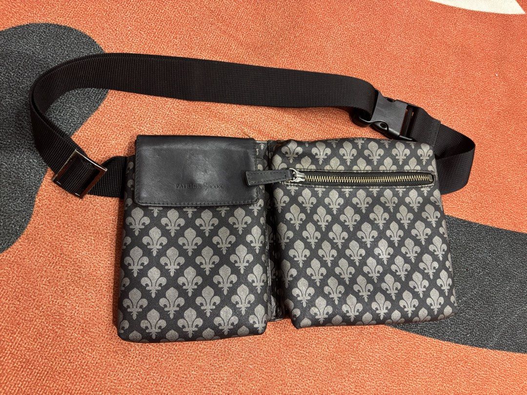 Patrick Cox Fleur-de-lis Pattern Waist Bag (Category: Luxury Bags & Wallets) located in Alicia. Submitted by thriftbagph (Listing ID 1462416917, Image 1). Description: - Authentic Patrick Cox waist bag - Signature fleur-de-lis pattern - Color: Black and Grey - Adjustable strap with buckle closure - Main zippered compartment - Front flap pocket with leather detail - Ideal for keeping your essentials easily accessible - sign of usage on strap.