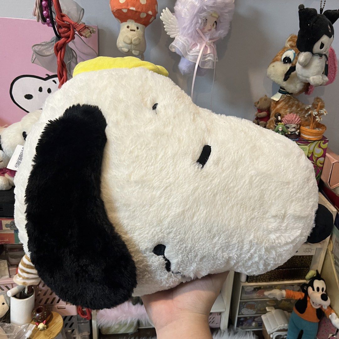 Peanuts Snoopy Head Plush Pillow (Category: Plushies & Soft Toys) located in Malolos. Submitted by babebunzz (Listing ID 1462372860, Image 2). Description: - Super soft and fluffy Snoopy plush pillow - Officially licensed Peanuts merchandise - Large size, perfect for hugs - Great for lounging or as a cute room decoration - Official Peanuts tag attached.