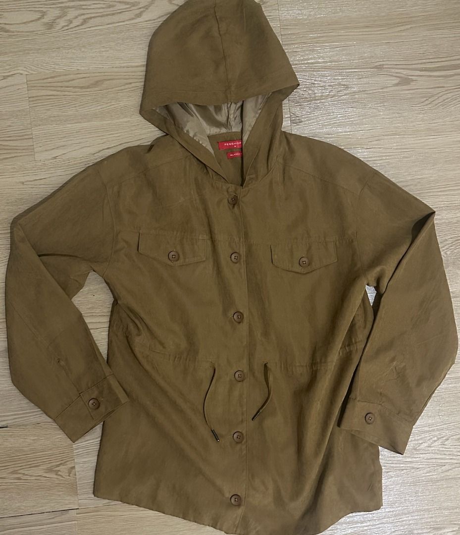 Penshoppe | Brown Hooded Utility Jacket with Drawstring Waist (Category: Coats, Jackets and Outerwear) located in Makati City. Submitted by _rentorbuy (Listing ID 1462414820, Image 2). Description: - Hooded jacket - Button-up front with two chest pockets - Drawstring waist for adjustable fit - Long sleeves with button cuffs - Great for layering, for rainy days.