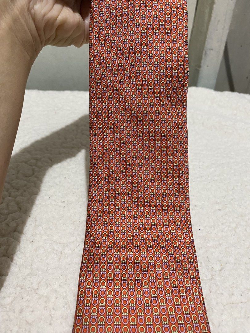 Perry Ellis Orange Patterned Silk Tie (Category: Ties) located in Manila. Submitted by resi.diaz (Listing ID 1462422830, Image 2). Description: - Brand: Perry Ellis - Color: Orange - Material: Silk - Style: Adds a touch of sophistication to any outfit.