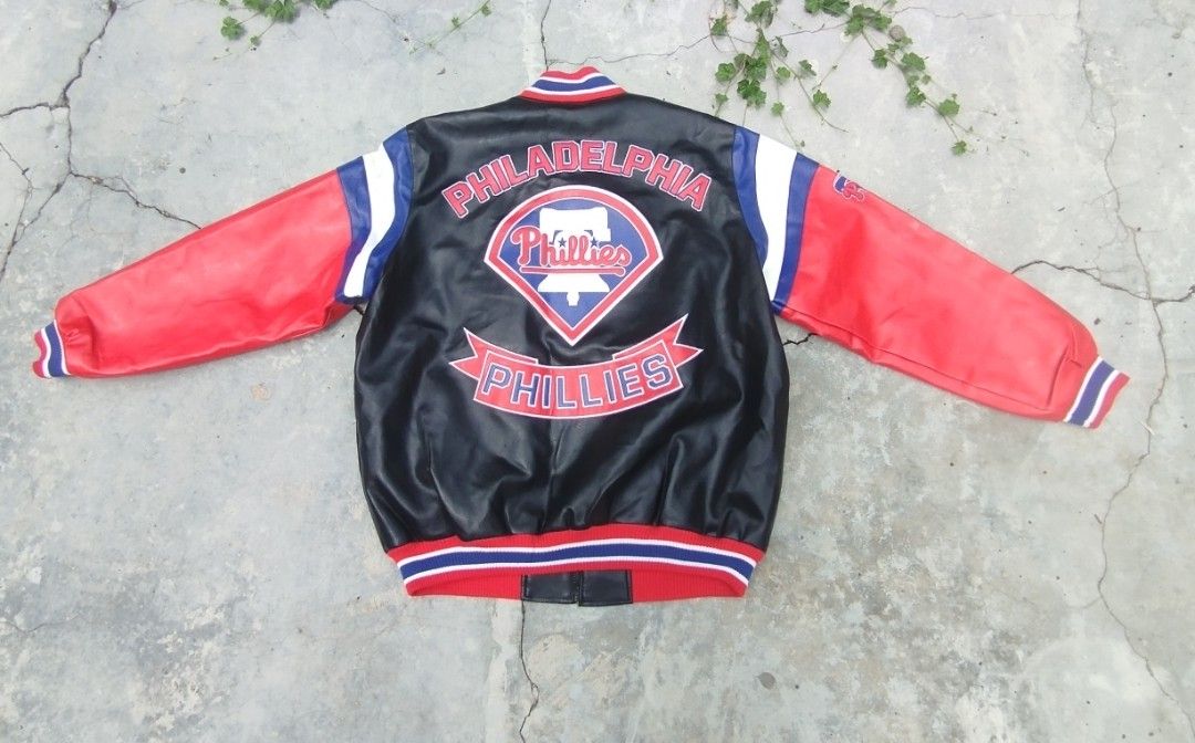 Philadelphia Phillies Baseball Jacket (Category: Coats, Jackets and Outerwear) located in Mati. Submitted by old_era.ph (Listing ID 1462297490, Image 1). Description: - Classic black and red baseball jacket - Features Philadelphia Phillies logo on front and back - "Philadelphia Phillies" text embroidered on the back - Ribbed collar, cuffs, and hem - Genuine merchandise - Size L.