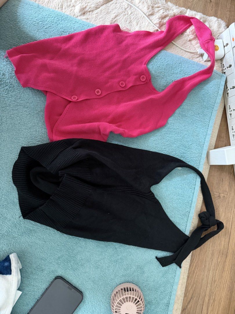 Pink and Black Knit Cardigans (Category: Coats, Jackets and Outerwear) located in Manila. Submitted by treeal (Listing ID 1462298312, Image 1). Description: - Two knit cardigans available: bright pink and black. - Unique strap design that ties at the back for a custom fit. - Pink cardigan features button closures. - Perfect for layering over outfits or wearing as a standalone piece. - Adds a stylish touch to any look..