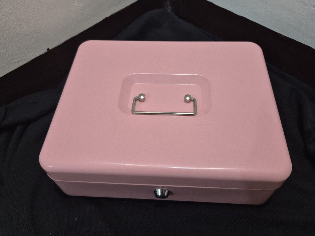 Pink Cash Box (Category: Everything Else Others) located in Manila. Submitted by shirozen26 (Listing ID 1462315322, Image 3). Description: - comes with 2 keys - in excellent condition (with minor scratches) - buyer will shoulder sf sf size: 30x24x9cm.