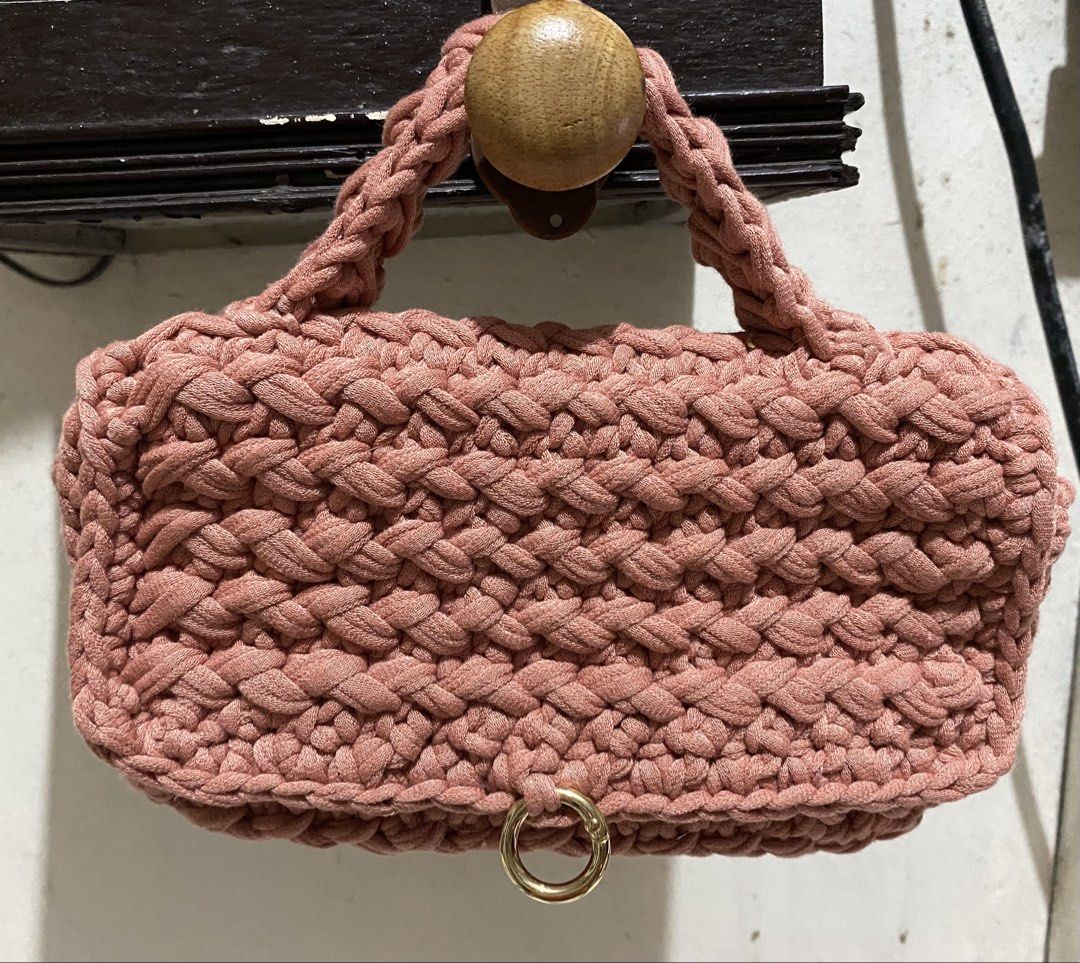 Pink Crocheted Handbag with Gold Clasp (Category: Shoulder Bags) located in Manila. Submitted by resi.diaz (Listing ID 1462360487, Image 1). Description: - Adorable pink crocheted handbag - Features a secure gold clasp closure - Comfortable crocheted handles - Ideal for carrying essentials - Perfect for nights out or casual days - Unique handmade aesthetic.