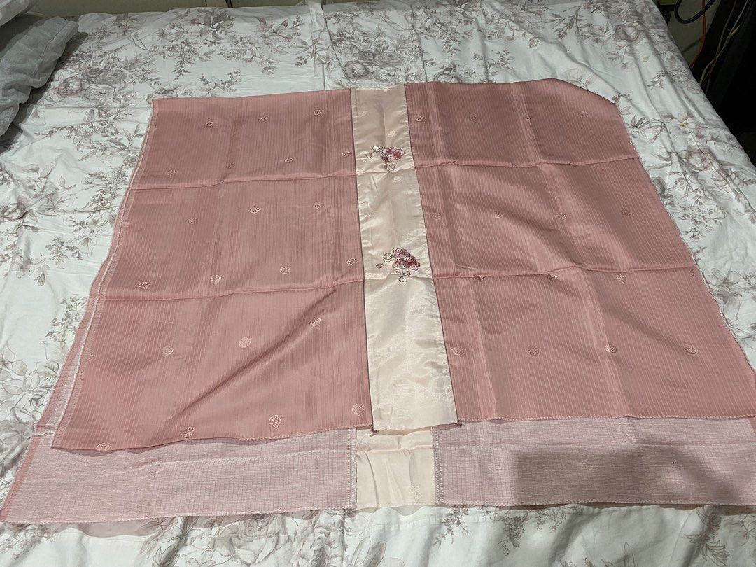 Pink Fabric with Floral Center Panel (Category: Other Home Decor) located in Manila. Submitted by resi.diaz (Listing ID 1462358809, Image 2). Description: - approx 41 x 71 inches - Pretty pink fabric - Central satin panel with embroidered flowers - Main fabric has subtle striped texture - Scattered small floral motifs on main fabric - Versatile for clothing or home decor - Neatly folded for storage.