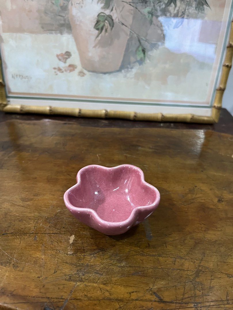 Pink flower-shaped ceramic trinket dish (Category: Dinnerware & Cutlery) located in Taguig. Submitted by minmin_parker (Listing ID 1462366856, Image 3). Description: - Adorable pink dish shaped like a flower. - Ideal for storing small jewelry, rings, earrings, or trinkets. - Features a beautiful glossy finish. - Perfect decorative piece for your vanity, dresser, or bedside table. - Compact size, fits easily anywhere..