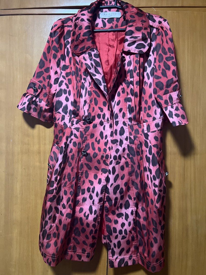 Pink Leopard Print Double-Breasted Trench Coat (Category: Coats, Jackets and Outerwear) located in Pasig City. Submitted by zebteashoppe01 (Listing ID 1462404279, Image 3). Description: - red leopard print trench coat - Double-breasted with button closure - Functional front pockets - Unique ruffled sleeve detail - Silky material for a luxurious feel - Perfect statement piece to elevate any outfit Suit like Fits small to med 09096535540 Gcash mop 
