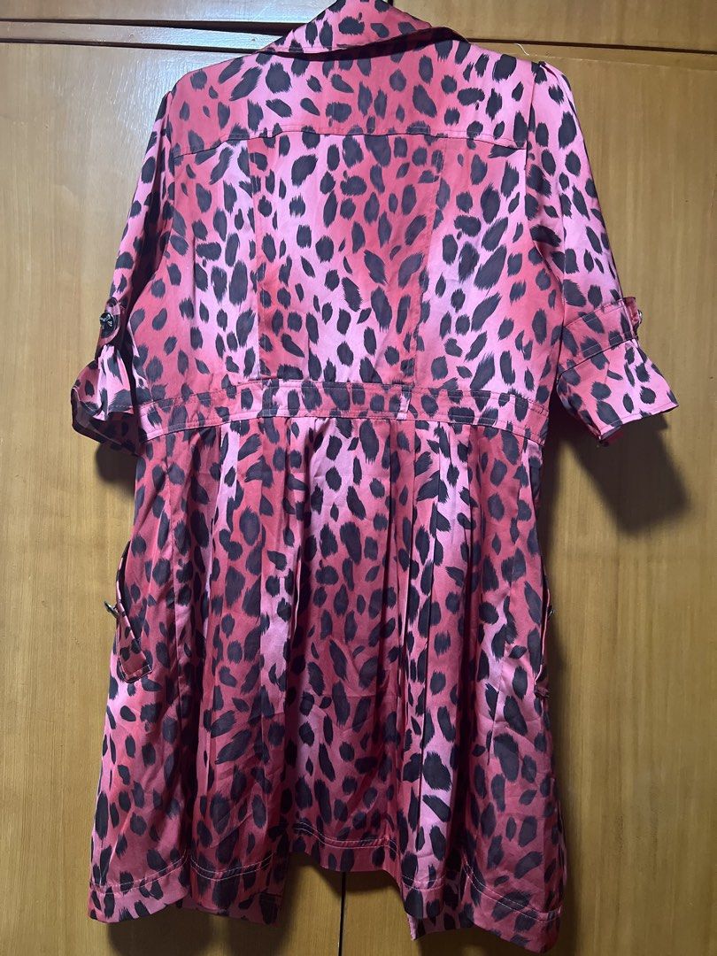 Pink Leopard Print Double-Breasted Trench Coat (Category: Coats, Jackets and Outerwear) located in Pasig City. Submitted by zebteashoppe01 (Listing ID 1462404279, Image 2). Description: - red leopard print trench coat - Double-breasted with button closure - Functional front pockets - Unique ruffled sleeve detail - Silky material for a luxurious feel - Perfect statement piece to elevate any outfit Suit like Fits small to med 09096535540 Gcash mop 