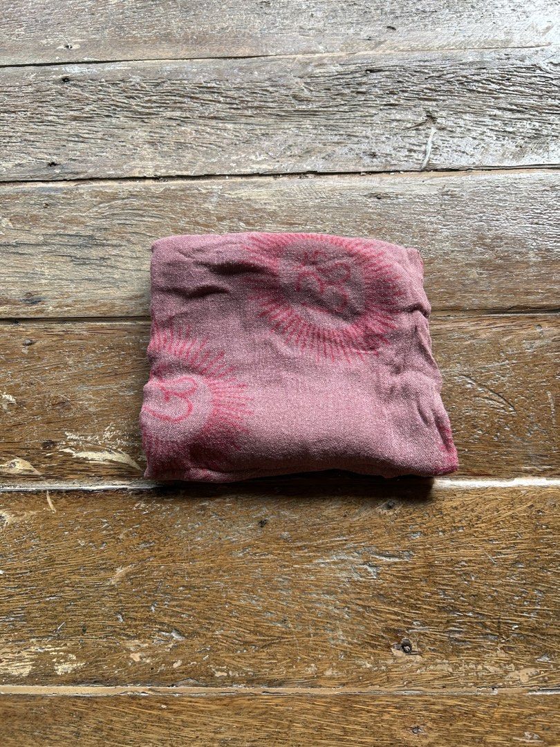 Pink patterned scarf (Category: Scarves) located in Surigao. Submitted by chastnavarrete (Listing ID 1462395461, Image 1). Description: - Pink scarf with a vibrant sunburst pattern. - Made from soft, comfortable fabric. - Approximate dimensions: 20x20 inches. - Perfect for adding a pop of color to any ensemble. - Can be styled in multiple versatile ways..