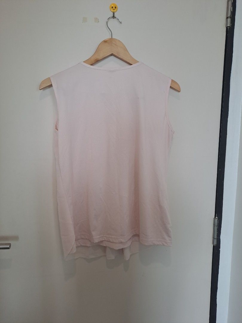 Pink sleeveless (Category: Sleeveless) located in Manila. Submitted by joanbalde39643 (Listing ID 1462367485, Image 2). Description: That is a light pink sleeveless blouse featuring an ornate, sequin-embellished neckline..