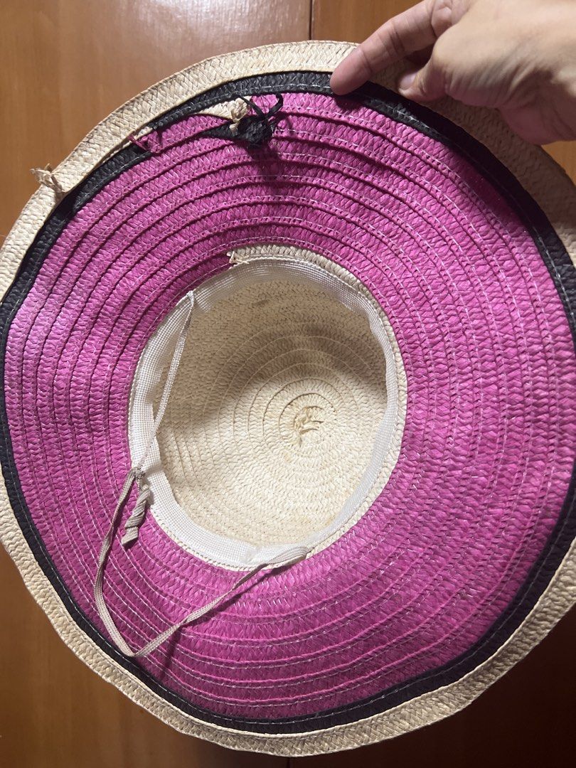 Pink Wide Brim Straw Hat (Category: Hats & Beanies) located in Pasig City. Submitted by zebteashoppe01 (Listing ID 1462409978, Image 2). Description: - Cute woven straw hat - Wide pink brim with black trim - Inner tie for adjustable fit - Ideal for sunny days, beach, or casual outings Pink no ribbon .