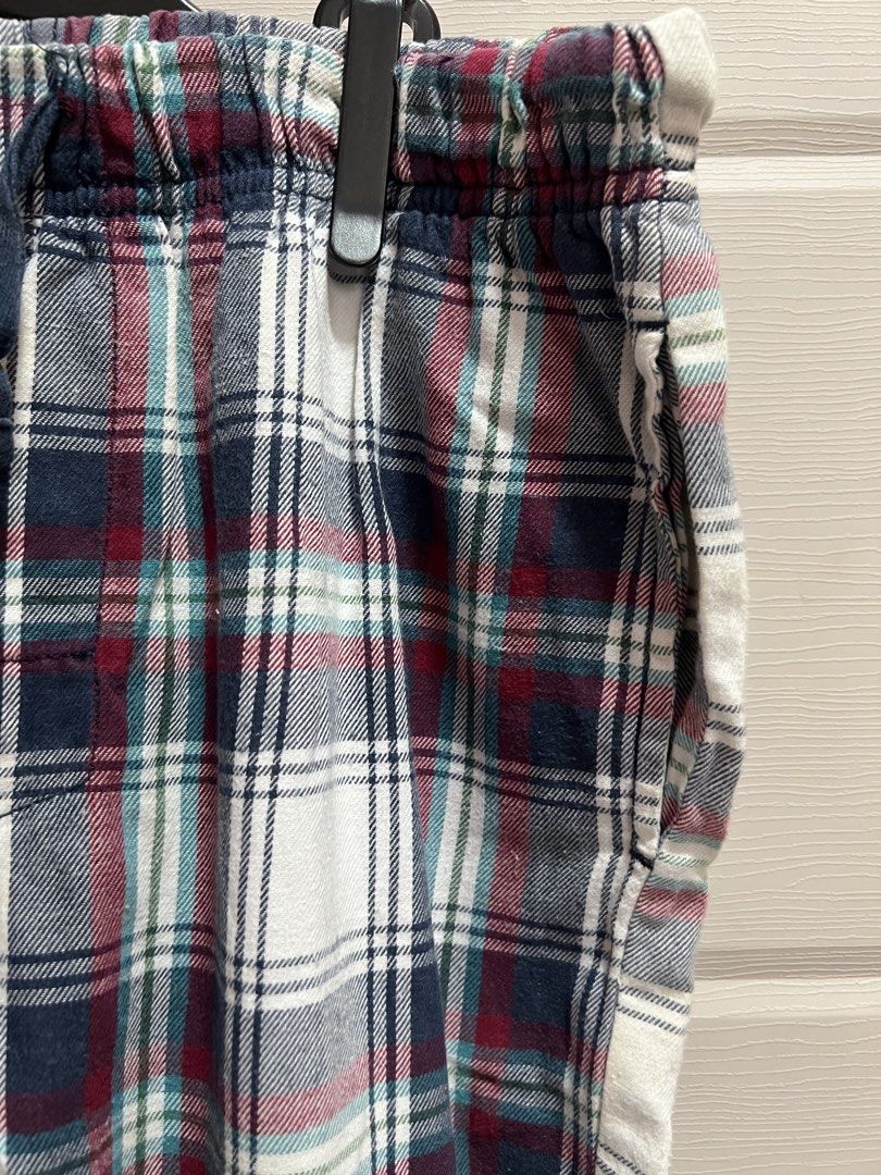 Plaid Pajama Pants with Drawstring Waist (Category: Babies & Kids Fashion) located in Cainta. Submitted by p3spreloved (Listing ID 1462303195, Image 3). Description: - Cozy plaid pajama pants - Elastic waistband with drawstring tie - Convenient side pockets - Cuffed ankles for a snug fit - Ideal for lounging or sleeping - Made with soft, relaxing fabric Length of pants 35in Waist 14in when laid flat but still stretchable upto 17in .