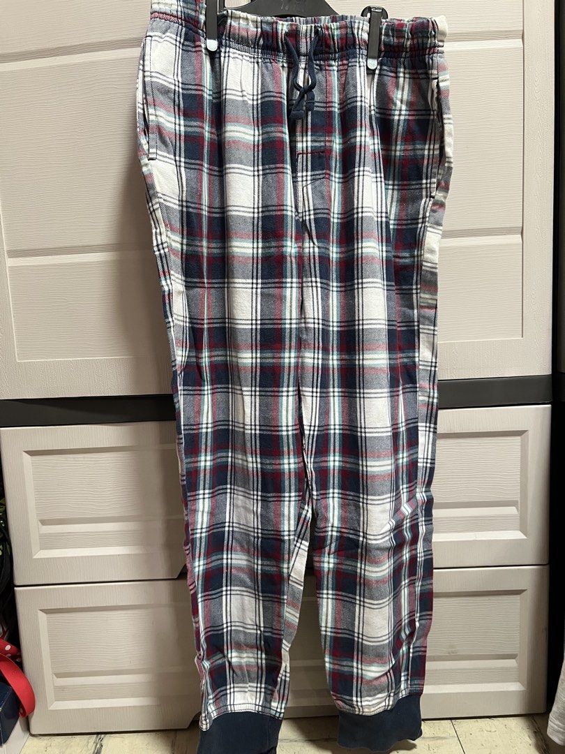 Plaid Pajama Pants with Drawstring Waist (Category: Babies & Kids Fashion) located in Cainta. Submitted by p3spreloved (Listing ID 1462303195, Image 1). Description: - Cozy plaid pajama pants - Elastic waistband with drawstring tie - Convenient side pockets - Cuffed ankles for a snug fit - Ideal for lounging or sleeping - Made with soft, relaxing fabric Length of pants 35in Waist 14in when laid flat but still stretchable upto 17in .