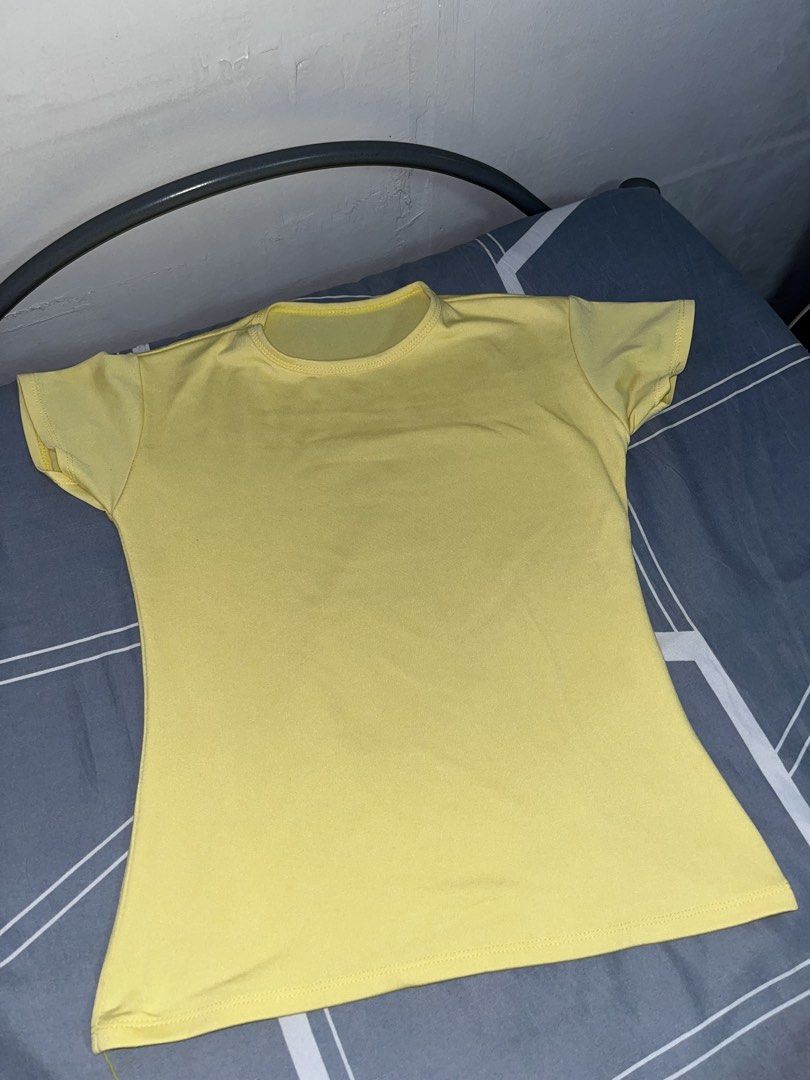 Plain Yellow T-shirt (Category: Others Tops) located in Manila. Submitted by thelvieee (Listing ID 1462313888, Image 1). Description: - Simple and classic yellow t-shirt - Made with soft, comfortable fabric - Ideal for everyday wear - Effortlessly pairs with any bottoms - A must-have basic for your wardrobe - Can fit to small to medium body frame.