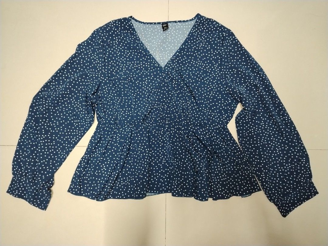 (plus size) polkadot peplum blouse navy blue (Category: Blouses) located in Quezon City. Submitted by mistyforestph (Listing ID 1462347796, Image 1). Description: - no issues - stretchable - size: length 24", width 22" meetup: novaliches bayan shipping: j&t or lalamove mop: gcash or bank transfer (strictly no COD).