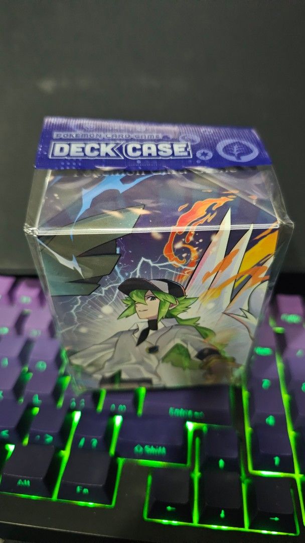 Pokemon Deck Case - N & Reshiram/Zekrom Art (Category: Card Boxes & Cases) located in Pasig City. Submitted by disabledeyecollects (Listing ID 1462419713, Image 1). Description: - Brand New & Sealed Pokemon Deck Case - Features exclusive artwork of N with Reshiram and Zekrom - Ideal for storing and protecting your Pokemon card decks - Stylish and unique addition to any Pokemon collection - Keep your valuable cards safe and organized.