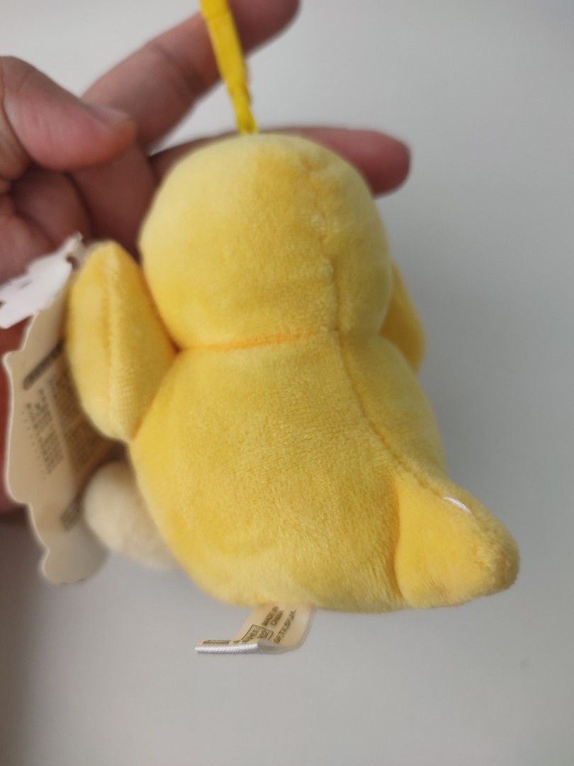 Pokemon Psyduck Plush Keychain (Category: Plushies & Soft Toys) located in Manila. Submitted by epicmountain-f20453 (Listing ID 1462360664, Image 3). Description: - Adorable yellow Psyduck plush toy - Includes a yellow clip for easy hanging - Brand new with original tag attached - Ideal for Pokemon enthusiasts and collectors - Small and portable, perfect for attaching to bags or keys.