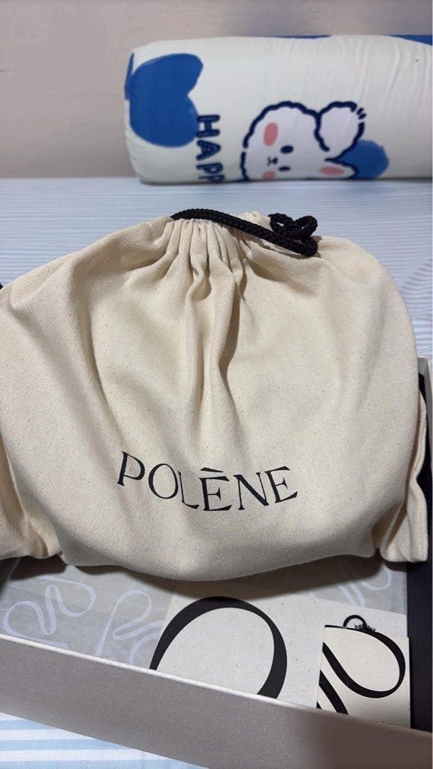 Polène Numéro Dix Bag Black Grained Leather (Category: Luxury Bags & Wallets) located in Lian. Submitted by dnllmgpnty (Listing ID 1462309612, Image 2). Description: - Polène Numéro Dix bag - Color: Black - Material: Grained leather - Includes: Dust bag, box, straps - Features: Adjustable strap - Style: Minimalist, chic - Perfect for: Daily use or special occasions.