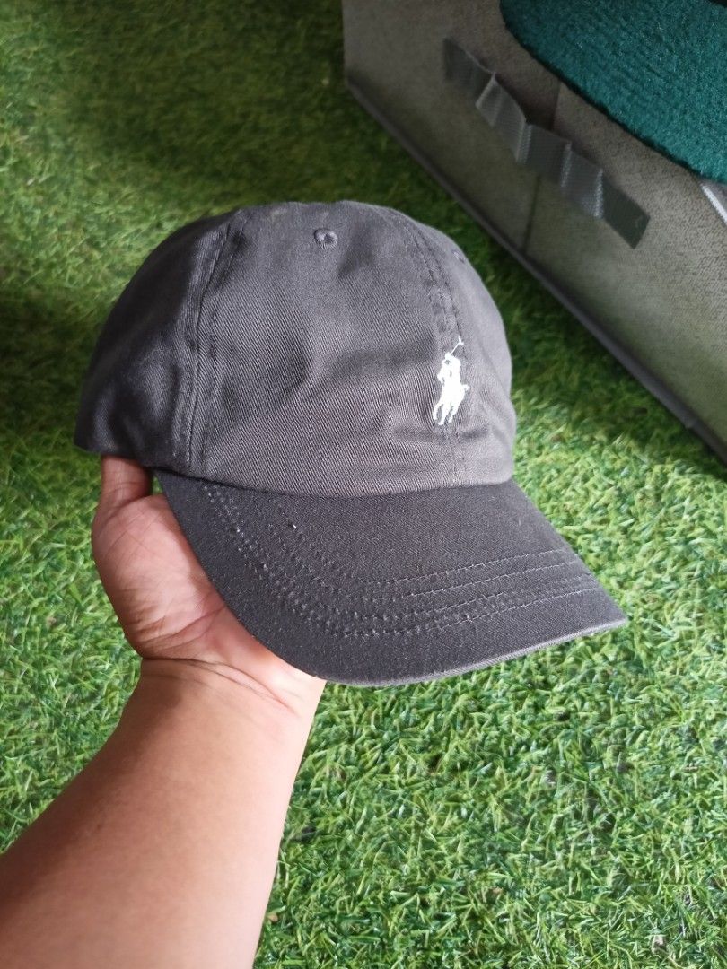 Polo Ralph Lauren Cap (Dark Gray) (Category: Caps & Hats) located in Abucay. Submitted by vcc.plug (Listing ID 1462374618, Image 2). Description: Still excellent - Washed - Adult size One size fits all Minimal loose stitch only (upper brim).
